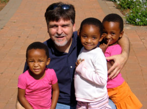 Ray and children in Botswana
